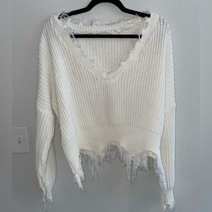 A4 - 249 V neck cream distressed knit stringy sweater one size